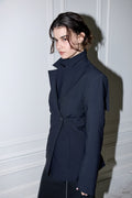 MONA stretch gabardine blazer with open back, side view on model