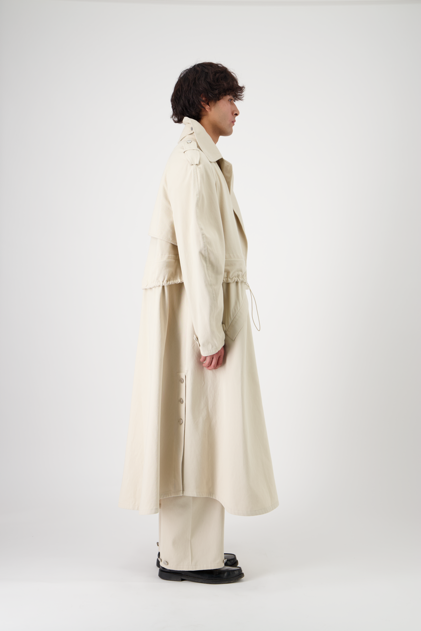 CARAVEL cotton gabardine trench coat, full-length side view on model