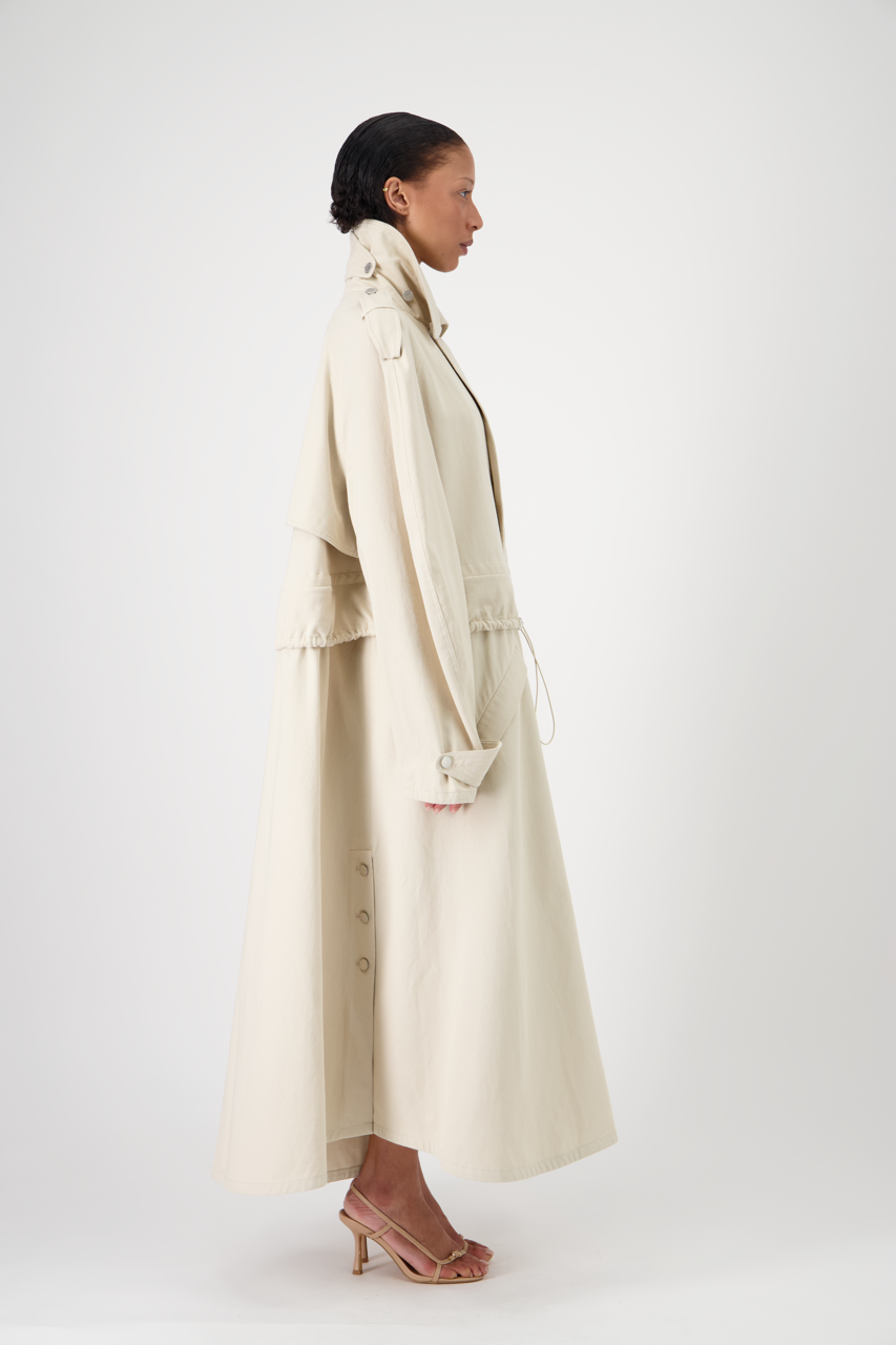 CARAVEL cotton gabardine trench coat, full-length side view on model