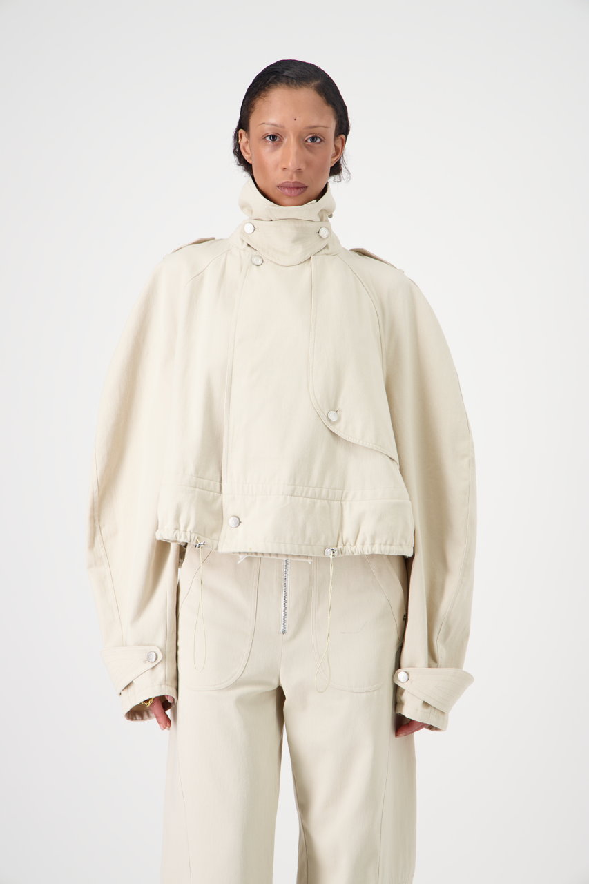 CARAVEL cotton gabardine trench coat, closed, mid-length front view on model