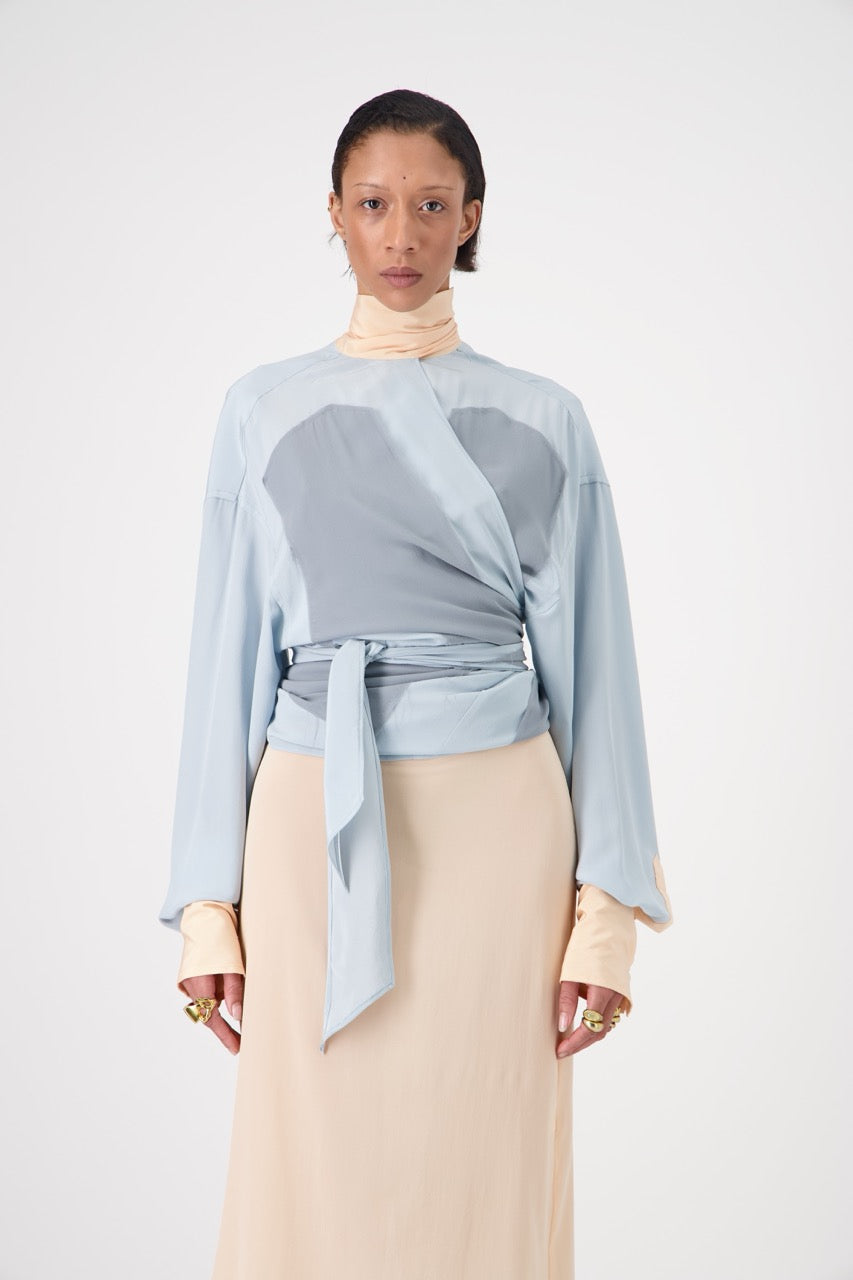 LAVA silk top with lavallière knot collar, front view on model, fully closed