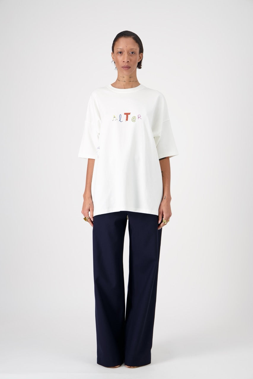 SUN oversized unisex cotton and SeaCell T-shirt, front view on woman model, dark pants