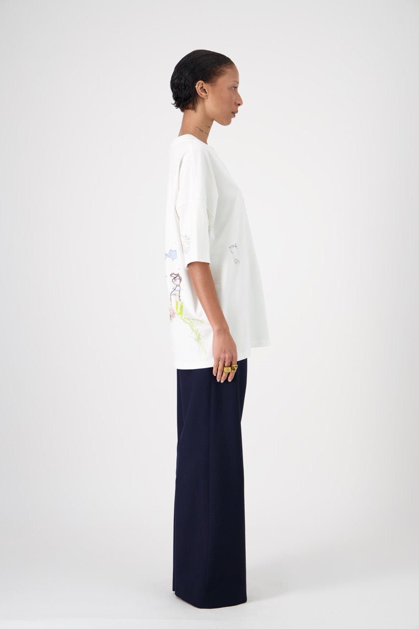 SUN oversized unisex cotton and SeaCell T-shirt, side view on woman model, dark pants