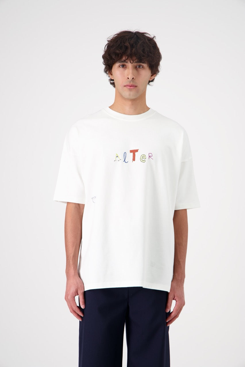 SUN oversized unisex cotton and SeaCell T-shirt, front view on man model, close view, dark pants
