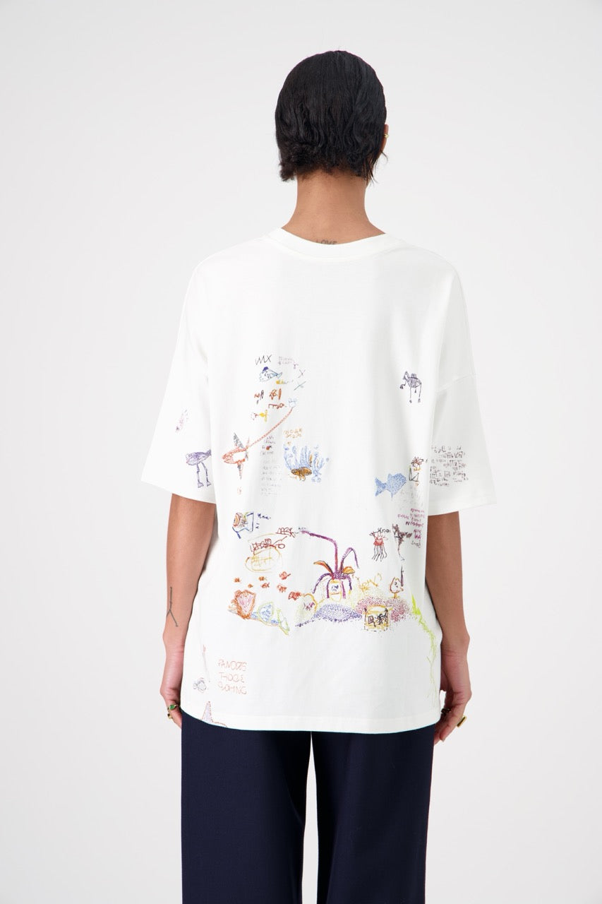SUN oversized unisex cotton and SeaCell T-shirt, back view on woman model, close view, dark pants